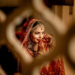 A beautiful Indian bride in Chandigarh adorned in traditional bridal wear and jewelry.